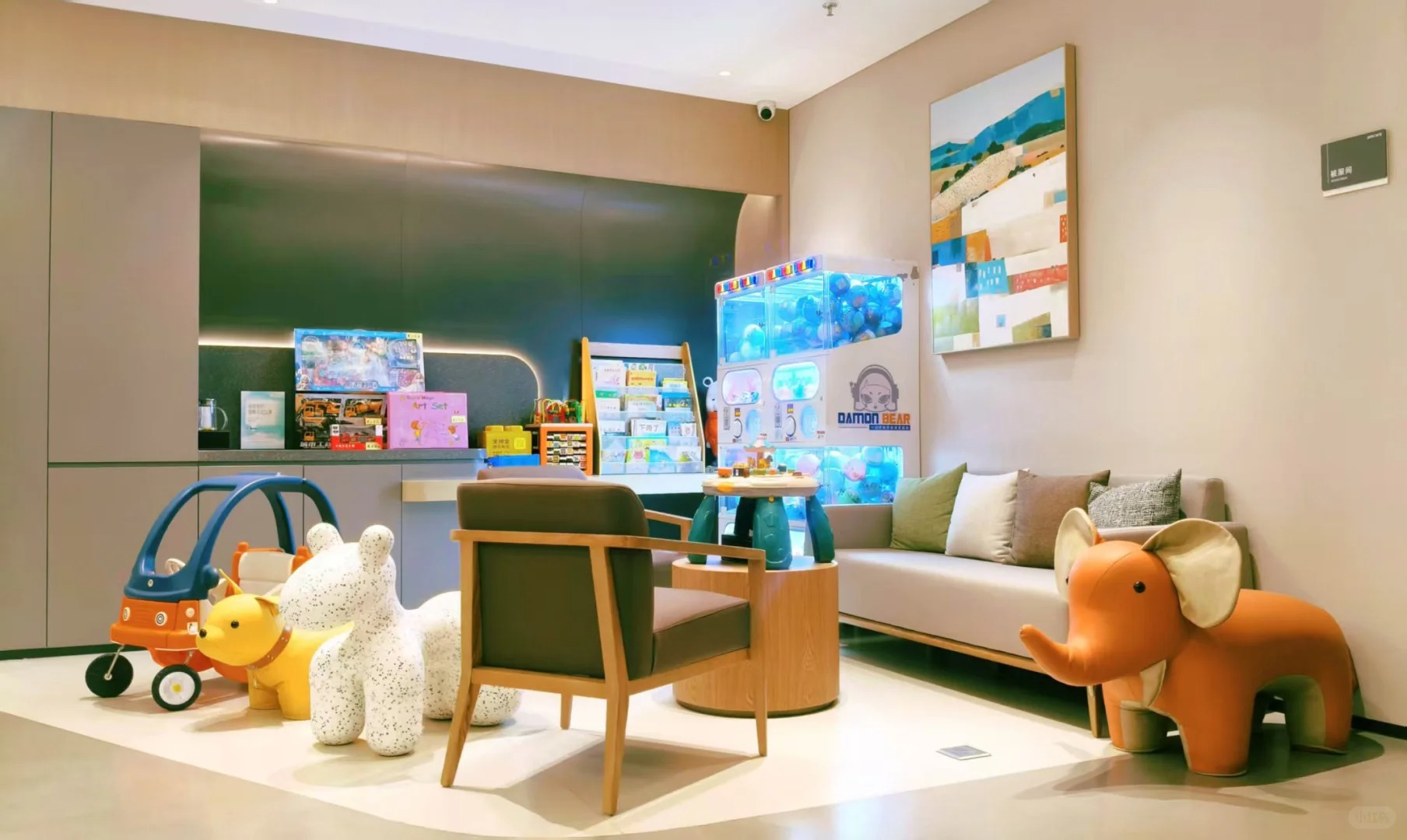 Children's play area and waiting zone with toys and kid-friendly furniture